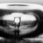 Cavitating bubble on a target surface